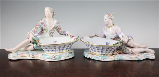 A pair of Meissen figural sweetmeat dishes, 19th century, length approx. 28cm, both with losses and slight restorations